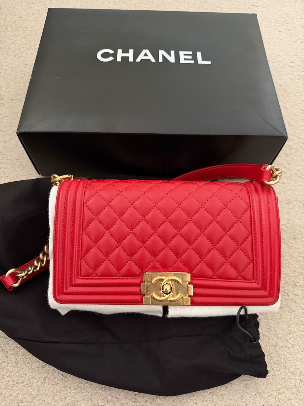 CHANEL Red Quilted Boy Bag with Gold Hardware